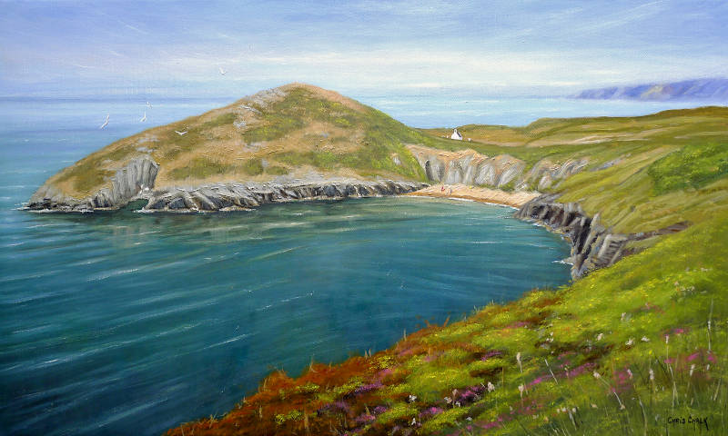 A oil painting of Mwnt beach and Mwnt church in Ceredigion