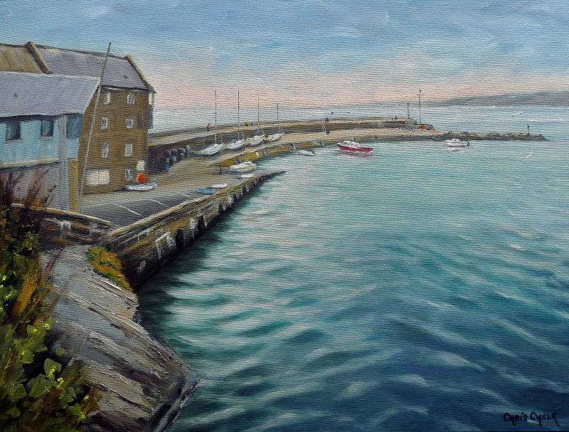 A art print of New Quay town in west Wales with its historic peir and harbour